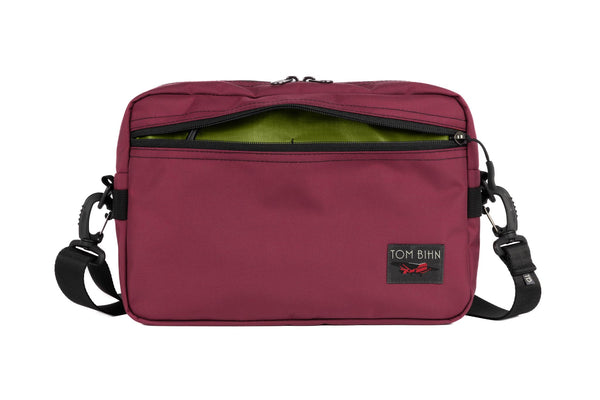 Side Hustle in Raspberry Ballistic with Moss 210 Cerylon interior